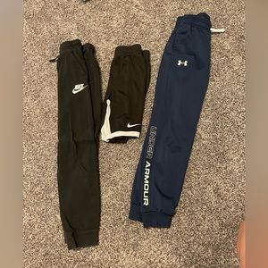1 Nike Shorts, 1 Nike sweats, 1 Under Armour sweats